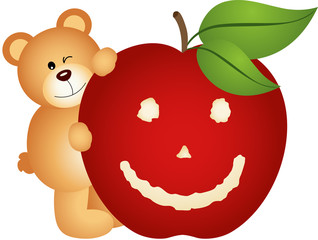 Teddy bear with smiling apple