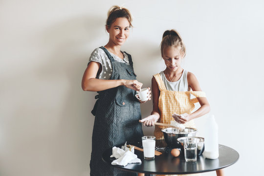 Mom baking with her daughter