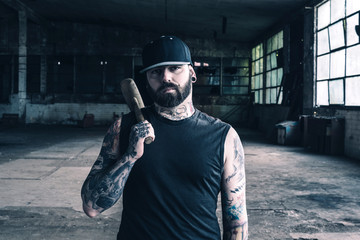 Tattooed man with the hammer