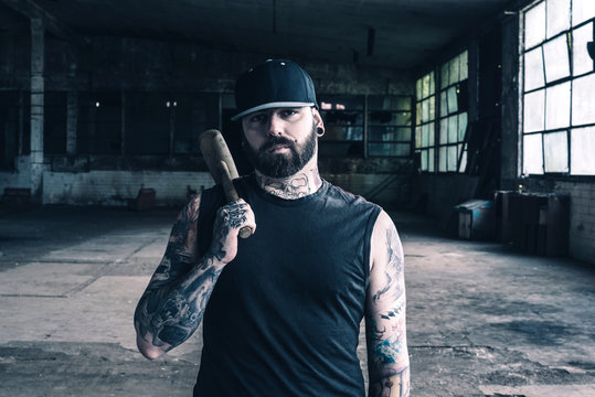 Tattooed Man With The Hammer