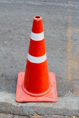 The traffic cone on a road