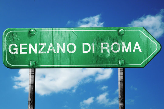 Genzano di roma road sign, vintage green with clouds background