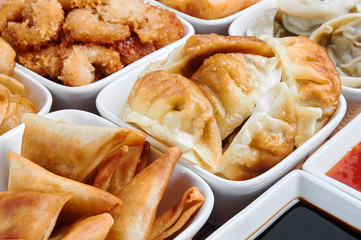 Asian snacks in white bowls