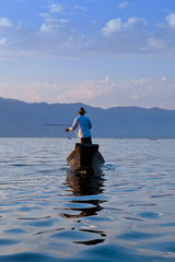 An unidentified Intha fisherman catches fish for food on Inle Lake, Shan state, Myanmar