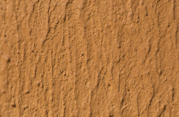 Textured brown wall with pattern