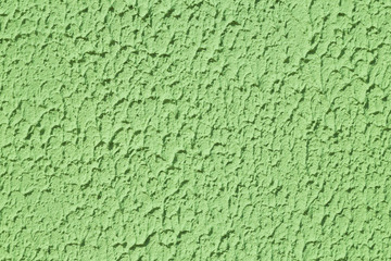 Textured green wall with pattern