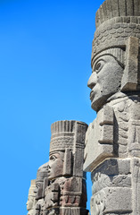 Atlantean figures against blue sky at the archaeological sight in Tula 