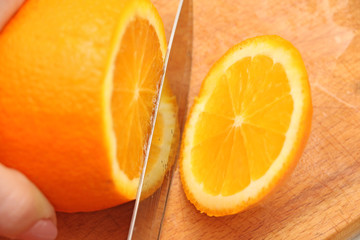 sliced oranges on a tree, the particles