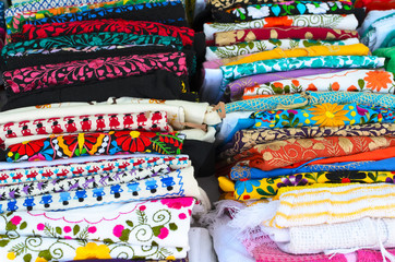 Folded colorful authentic Mexican women's shirts 
