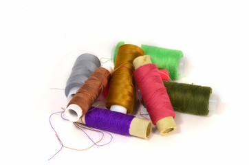 A set of coils with different colored threads