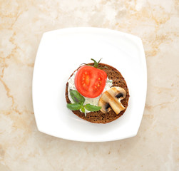 sandwich with mushrooms and tomatoes. top view