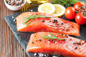 Raw salmon fillet with spices