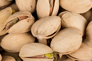 Pistachio nuts arranges as background