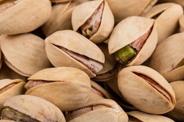 Pistachio nuts arranges as background