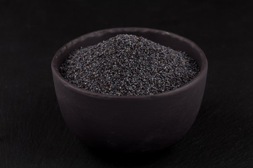 poppy seeds in a stone bowl