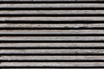 wooden shutters, covering a window or door