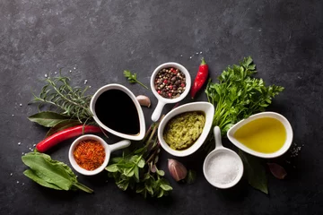 Keuken spatwand met foto Herbs, condiments and spices © karandaev