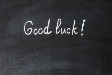 Obraz premium Good luck - text written on the chalkboard