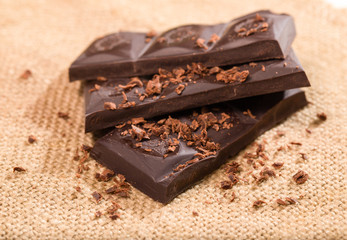 Chocolate pieces with a chocolate crumb on a sacking