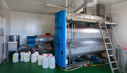 Oil filling engines in workshop