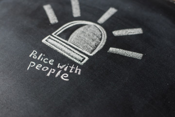 police flashers drawn with chalk on blackboard