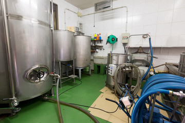 Mechanisms for filling containers with oil.