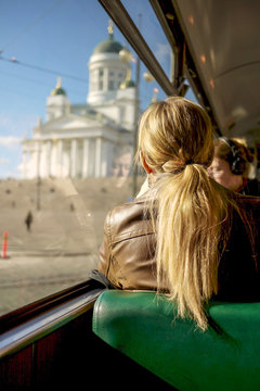 People Commute During The Peaceful Morning On A Tram Passing By Helsinki Cathedral, Finland