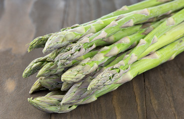 Asparagus on wooden background