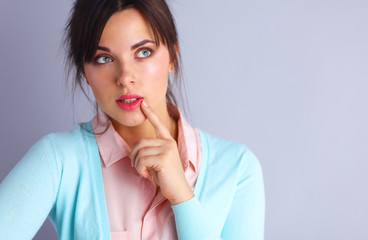 Portrait of an attractive fashionable young brunette woman