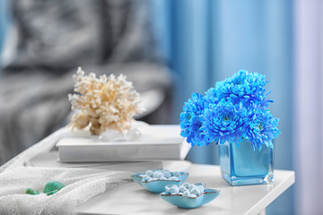 Blue home decor on bedside table in the room
