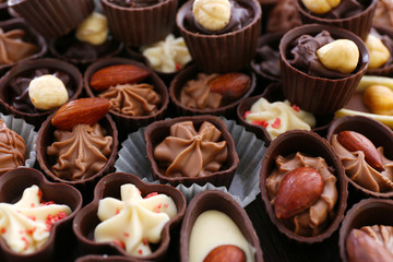 Delicious chocolate candies background, close up