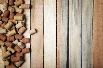Wine corks on wooden background