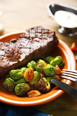 Grilled steak with vegetables, closeup