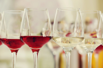Wine glasses with red and white wine, closeup