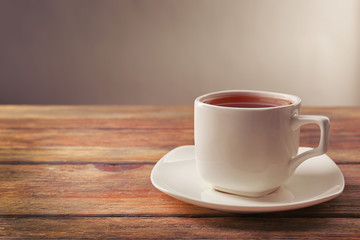Cup of tea on wooden table