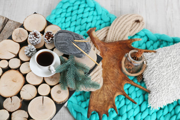 Cup of hot drink in living room. Comfortable winter weekend or holidays at home