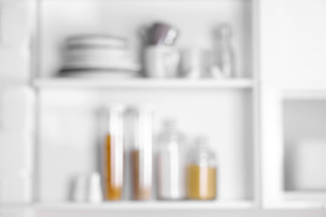 Tableware and kitchenware on a shelves