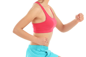 Sporty woman jogging isolated on white