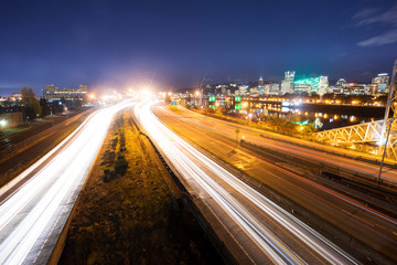 Fototapeta premium busy traffic on road at night in portland