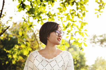 Asian Woman Dreaming Smiling Outside Concept