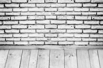 free space wood floors and brick wall.