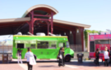 blurred background of people ordering at food truck