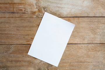 Blank paper on wood table