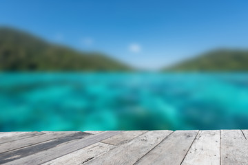Wood floor top on blue sea background