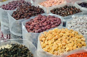Selective focus, Dried sweet fruits for sale at market in Chinatown, Bangkok, Thailand