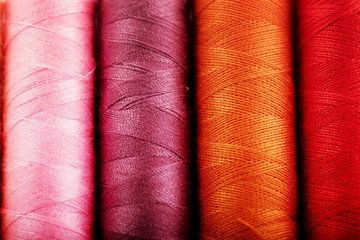 Background of colorful sewing threads