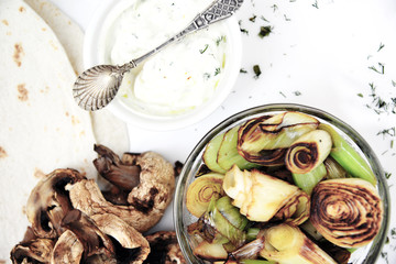 Roasted mushroom, leek and taco wrap with yogurt sauce