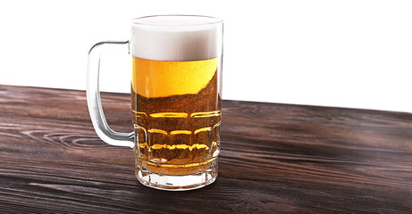 Glass of beer on white background