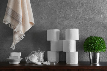 Bath accessories on grey wall background