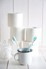 Bath accessories on wooden wall background